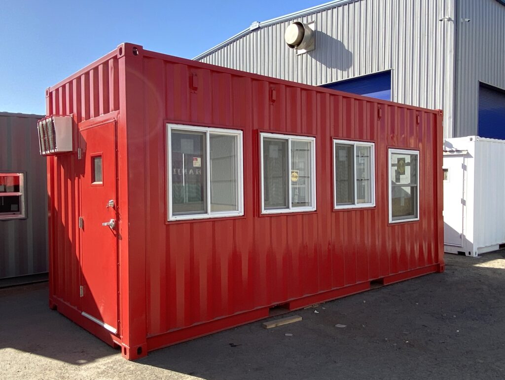 Shipping container modified with doors and windows